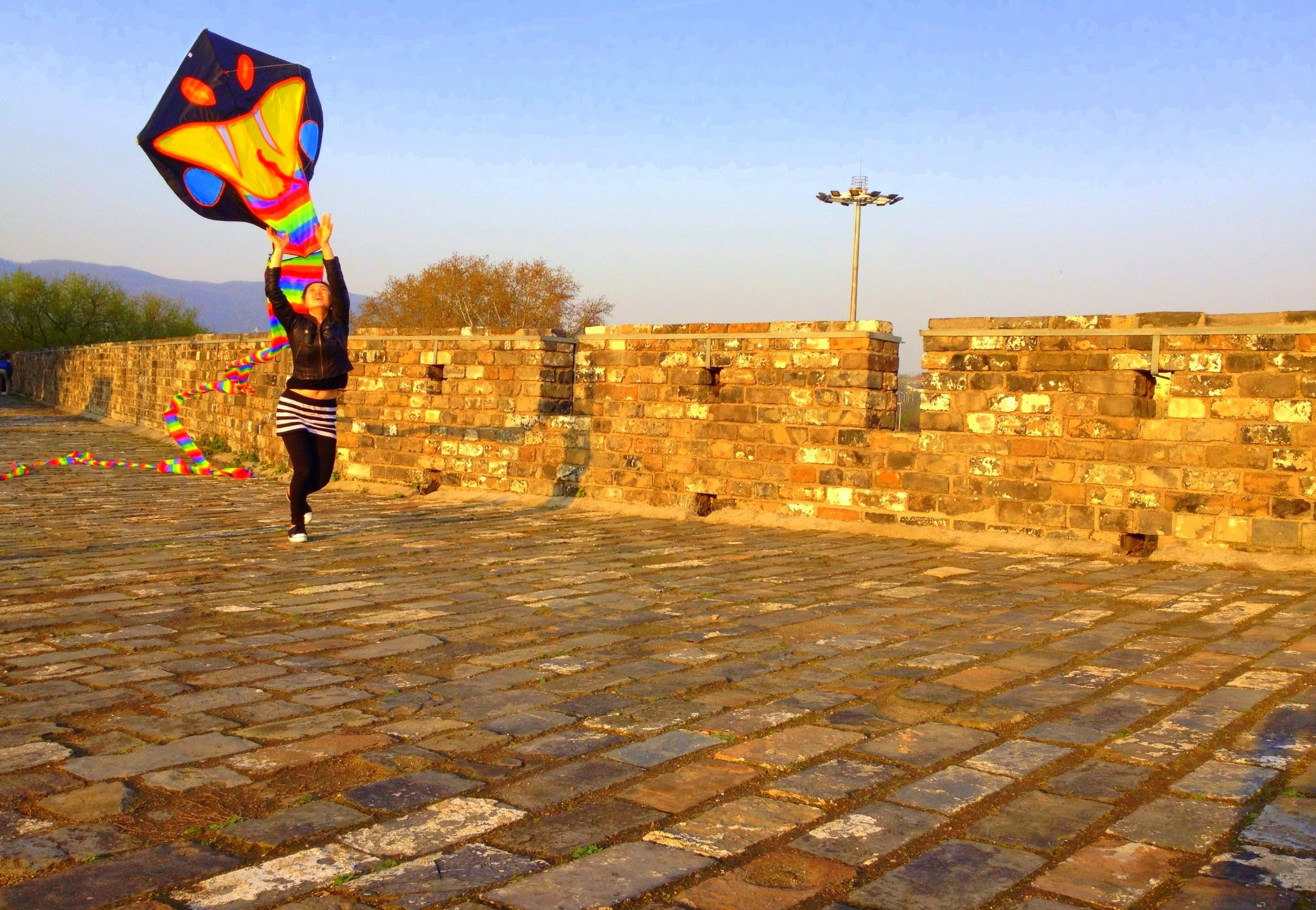 Flying a kite on the Nanjing city walls